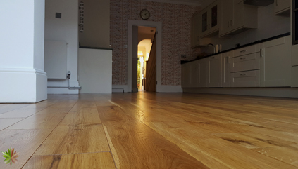 Revitalization of the kitchen oak floor in Kingston upon Thames